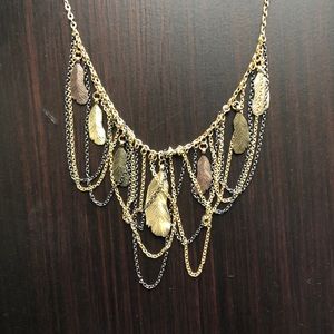 Mixed metal feather necklace